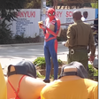 Police officer approaching 'Spider Man'