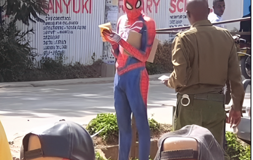 Police officer approaching 'Spider Man'