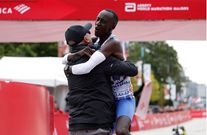 Kelvin Kiptum and his coach after winning the 2023 Bank of America Chicago Marathon