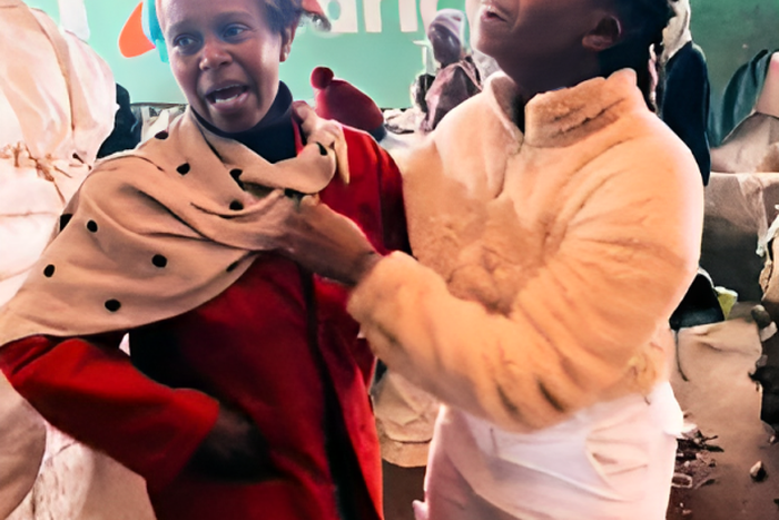 Muchai hugging her mum