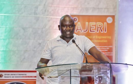 Engineer George Ouma Otieno explaining his innovation