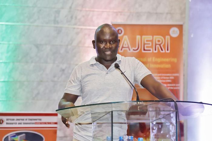 Engineer George Ouma Otieno explaining his innovation