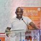 Engineer George Ouma Otieno explaining his innovation