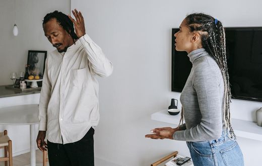 Unhappy young couple - What to do if  you've been caught cheating