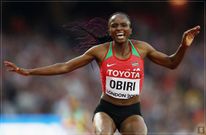 Hellen Obiri celebrates after winning a past race