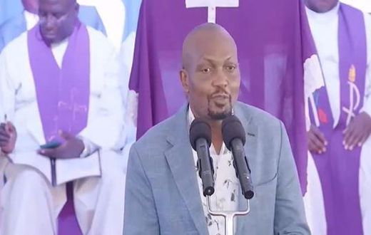 CS Moses Kuria speaking during the funeral service of Jimmy Wanjigi's father