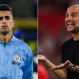 Joao Cancelo (left) and Pep Guardiola