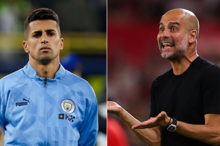 Joao Cancelo (left) and Pep Guardiola