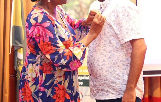 Chief Justice Martha Koome and Supreme Court photographer Zakheem Rajam