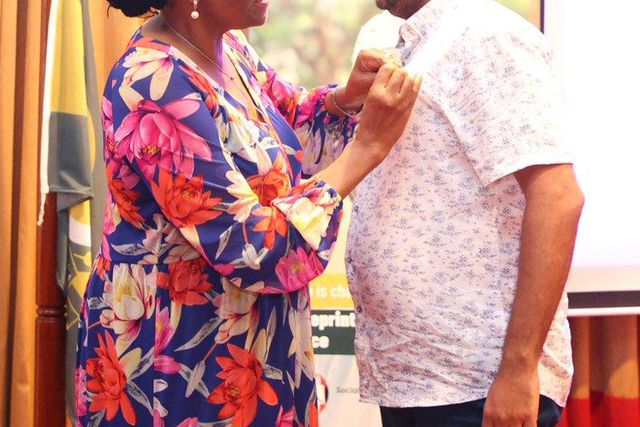 Chief Justice Martha Koome and Supreme Court photographer Zakheem Rajam