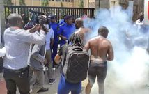 Eric Omondi leads protests outside parliament buildings