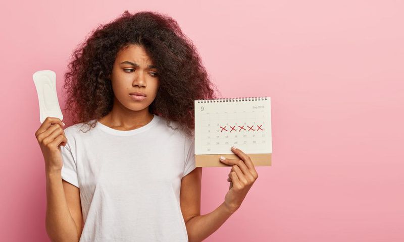 A young lady on calculating her menses