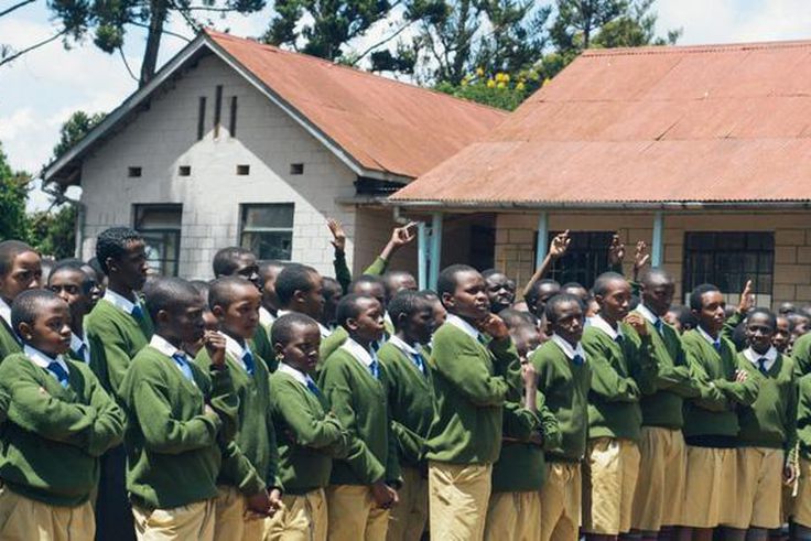 A photo of a teacher addressing Alliance High School students