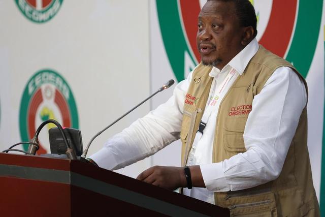 Uhuru Kenyatta speaking in Nigeria, where he is leading the African Union Election Observers' Mission (AUEOM).