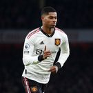 Marcus Rashford celebrates after opening the scoring against Arsenal on January 22, 2023.