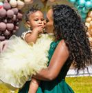 Grace Ekirapa with baby AJ