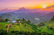 Ugandan village in the mountains at sunset