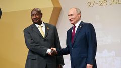 Museveni shakes hands with Putin at the Russia-Africa Summit