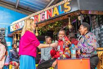 People enjoying Kenya Originals beverages