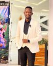 Actor Martin Githinji popularly known as Daddie Marto poses for a photo.