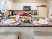 Sharing living spaces like bathrooms, kitchens, and dens with an owner or other guests isn't a big deal.
