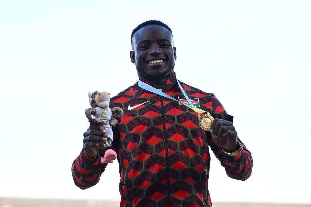 Gold medallist Kenya's Ferdinand Omanyala celebrates during the medal ceremony for the men's 100m athletics event at the Alexander Stadium, in Birmingham on day seven of the Commonwealth Games in Birmingham, central England, on August 4, 2022. (Photo b...