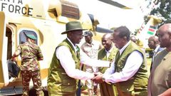President William Ruto shaking hands with Prime CS Musalia Mudavadi as DP Rigathi Gachagua watches in Kaptagat Forest in Elgeyo Marakwet County on July 1, 2023
