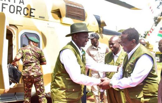 President William Ruto shaking hands with Prime CS Musalia Mudavadi as DP Rigathi Gachagua watches in Kaptagat Forest in Elgeyo Marakwet County on July 1, 2023