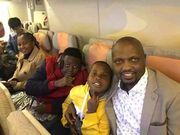 Moses Kuria, his wife Joyce Njambi and their two sons