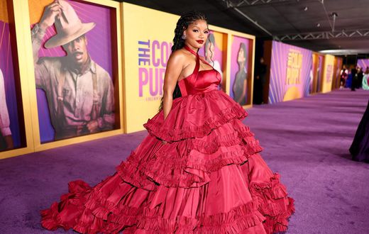 Halle Bailey, who plays a younger version of Ciara's character, opted for a voluminous tiered red dress for the occasion.