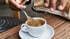 Adding sugar to tea