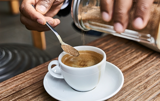 Adding sugar to tea