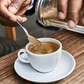 Adding sugar to tea