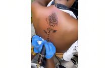 Fan tattoos Phoina's name on her back