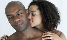 Black couple kissing