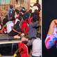 Peter Salasya (left) on top of the car and Manzi wa Kibera