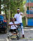 David Moya poses for a photo after donating a wheelchair [Photo: Instagram]