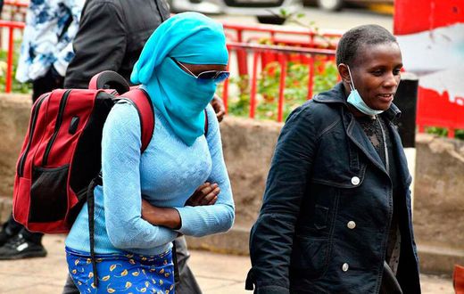 Poeple keeping warm during the Nairobi weather