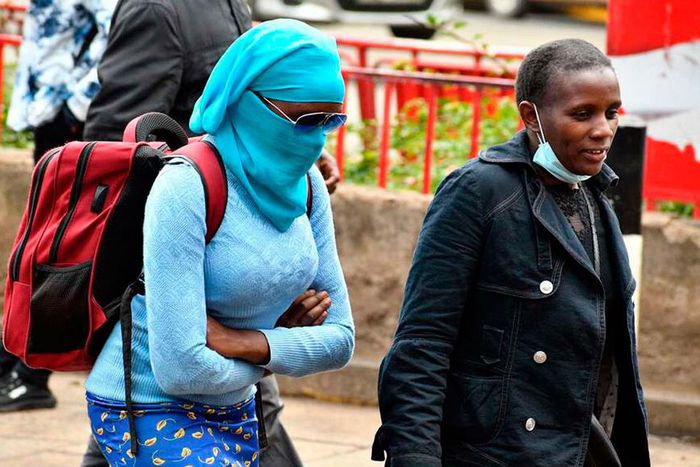 Poeple keeping warm during the Nairobi weather