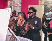 Diana Marua sheds tears as she views the body of her late grandmother
