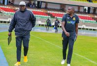 Francis Baraza (Left) with a member of Kenya Police technical bench