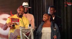 Twitter Influencer of the Year Boniface Mwangi hands over title to Esther Kazungu during the 2021 Pulse Influencer Awards ceremony