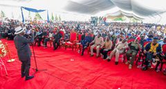 Raila Odinga addressing mourners inn Kanduyi, Bungoma county during the burial service of former MP Lawrence Sifuna