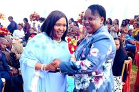 CS Rebecca Miano and Florence Bore embracing each other at the wedding