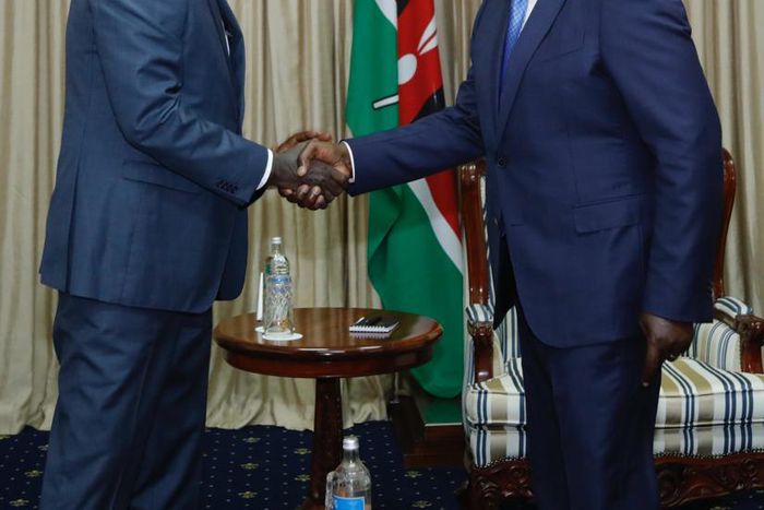 Chairperson of the African Union Commission Moussa Faki with President William Ruto