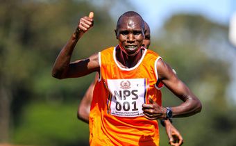 National Police Service Geoffrey Kamworor celebrates his lead ahead of Daniel Simiu in 10km senior men on January 6, 2023 during the National Police Service National Cross Country Championship, at Ngong race Course, Nairobi. Photo/CHRIS OMOLLO Copyrigh...