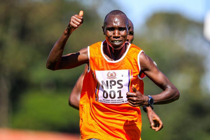 National Police Service Geoffrey Kamworor celebrates his lead ahead of Daniel Simiu in 10km senior men on January 6, 2023 during the National Police Service National Cross Country Championship, at Ngong race Course, Nairobi. Photo/CHRIS OMOLLO Copyrigh...