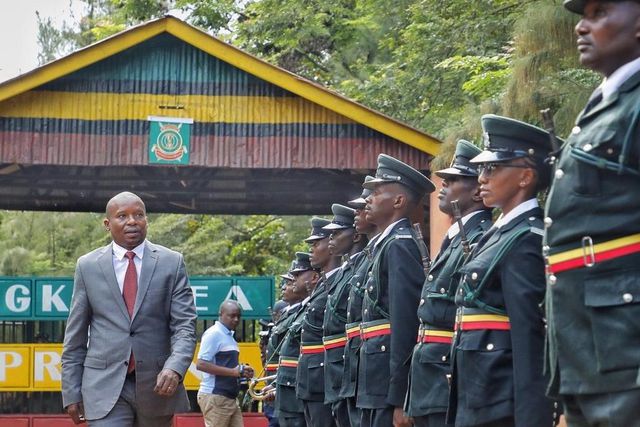 CS Kithure Kindiki inspects a guard of honour at Mwea Prison in Kirinyaga County on Monday, May 8, 2023.