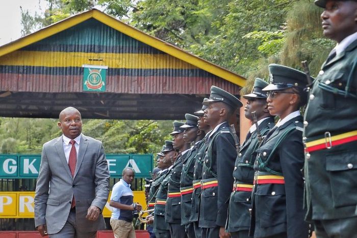 CS Kithure Kindiki inspects a guard of honour at Mwea Prison in Kirinyaga County on Monday, May 8, 2023.