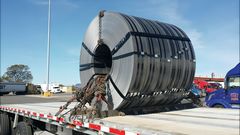 A steel coil well-secured in a trailer